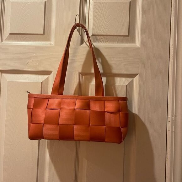 Harveys Handbags - Harvey’s the original seatbelt bag orange baguette style shoulder bag.